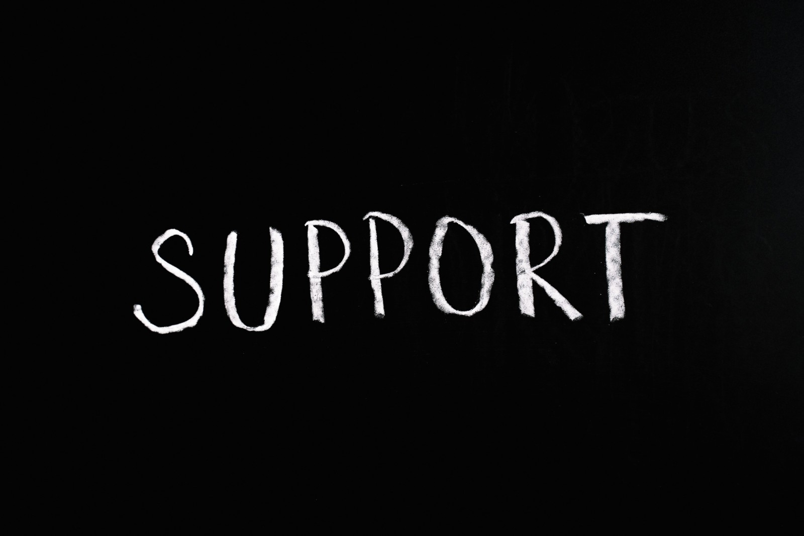 white letters "SUPPORT" on black background