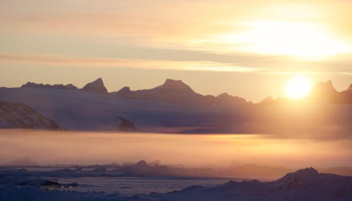 The view of a glacier from a scientific cruise to the Arctic. Alex has never visited the glaciers he models, but he gets to understand and see them in a different way. Image credit: Bryony Freer