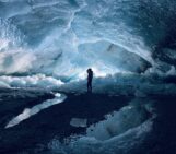 Peak glacier extinction in the mid-twenty-first century