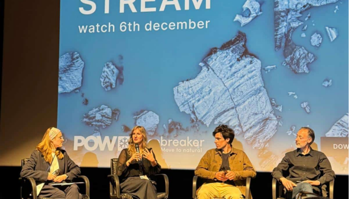 Four panalists are sat on a stage for the UNESCO day for glaciers. Larissa is second from the left.