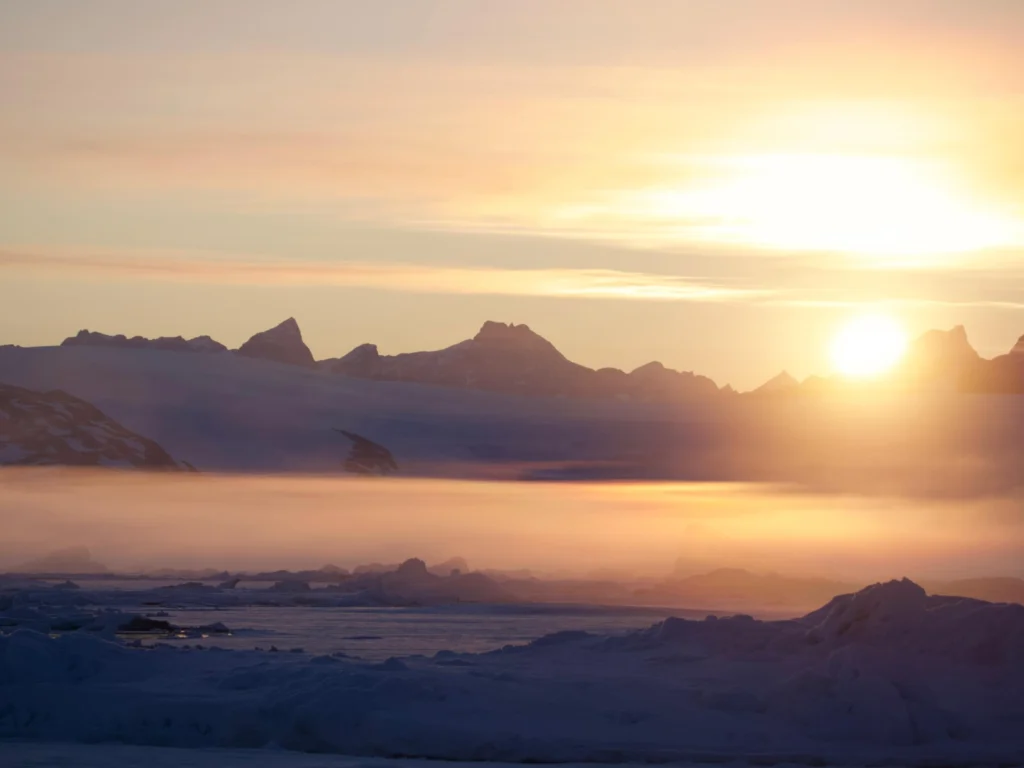 The view of a glacier from a scientific cruise to the Arctic. Alex has never visited the glaciers he models, but he gets to understand and see them in a different way. Image credit: Bryony Freer