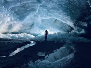 Peak glacier extinction in the mid-twenty-first century