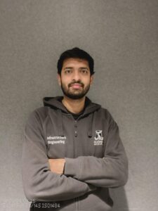 Portrait of Vivek looking at the camera
