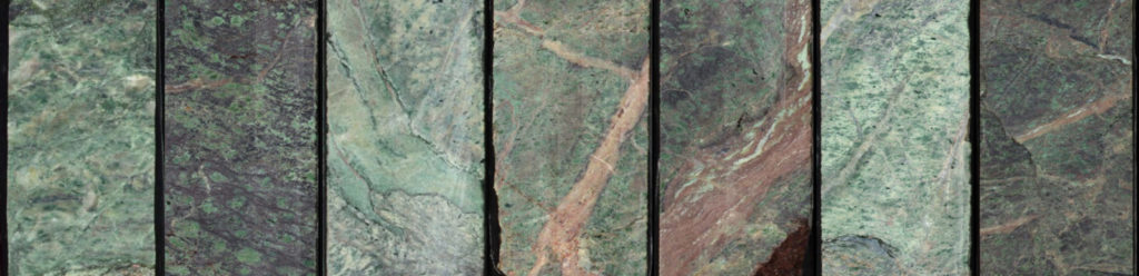 Photos of core samples of listvenite with abundant fuchsite (chromium mica) showing the range of bright green colours