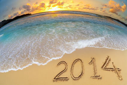 new year 2014 digits on ocean beach sand