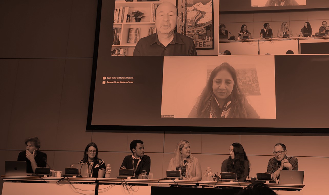 A panel of six physically present and 2 virtual speakers.