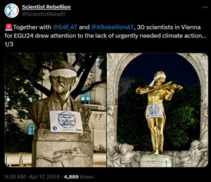 A tweet of scientist rebellion showing two golden figures being blindfolded.