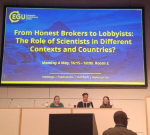 The image shows speakers at the Great Debate 1 during EGU26. From left to right: Lene Topp, Nicole Arbour and Linda Lammensalo. Lorenzo Melchor Fernandéz and Alessandro Allegra were presenting online. 