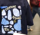 The image shows a t-shirt with a colorful design, signifying EDI at EGU.