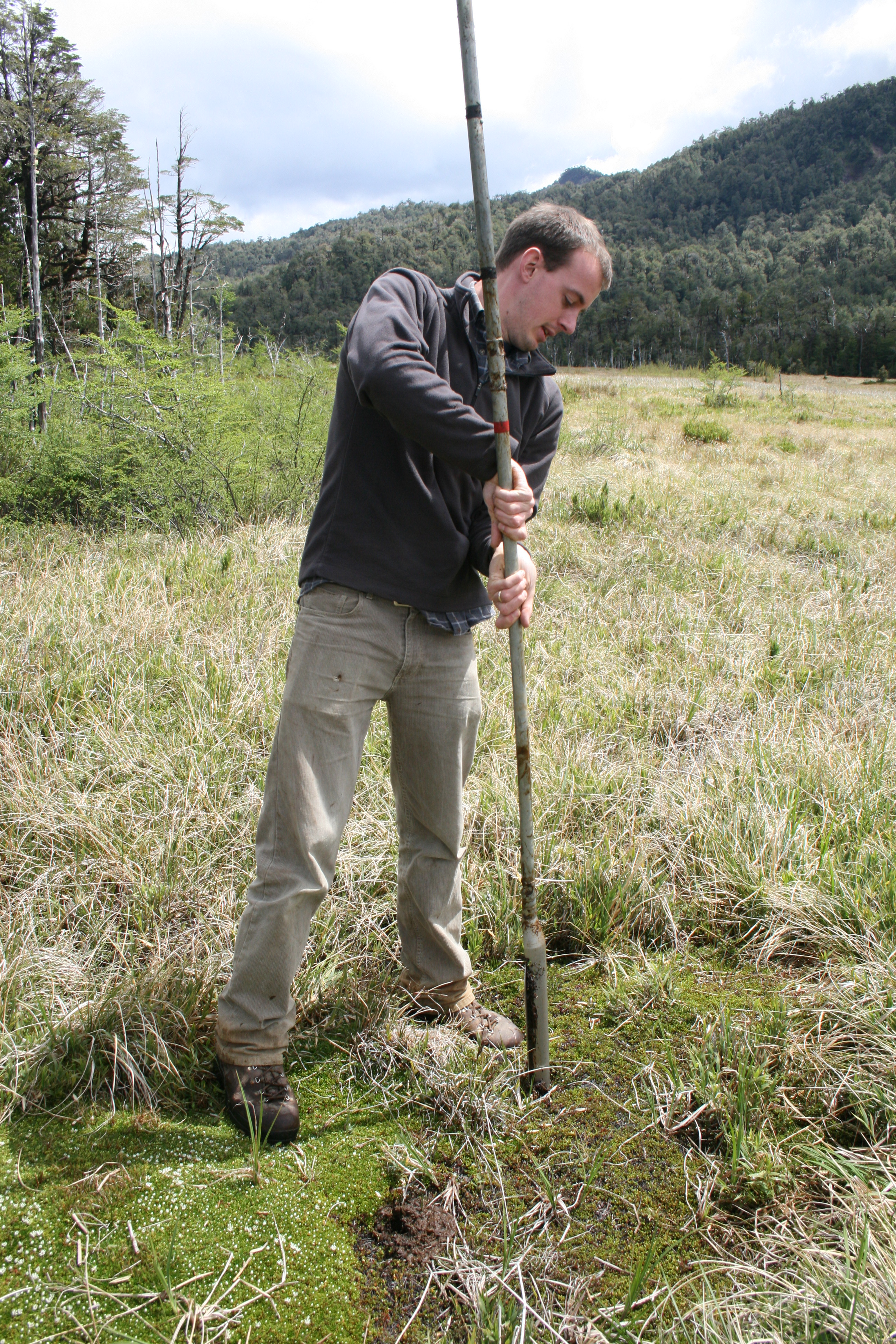 Sampling a peat bog in southern Chile. 
