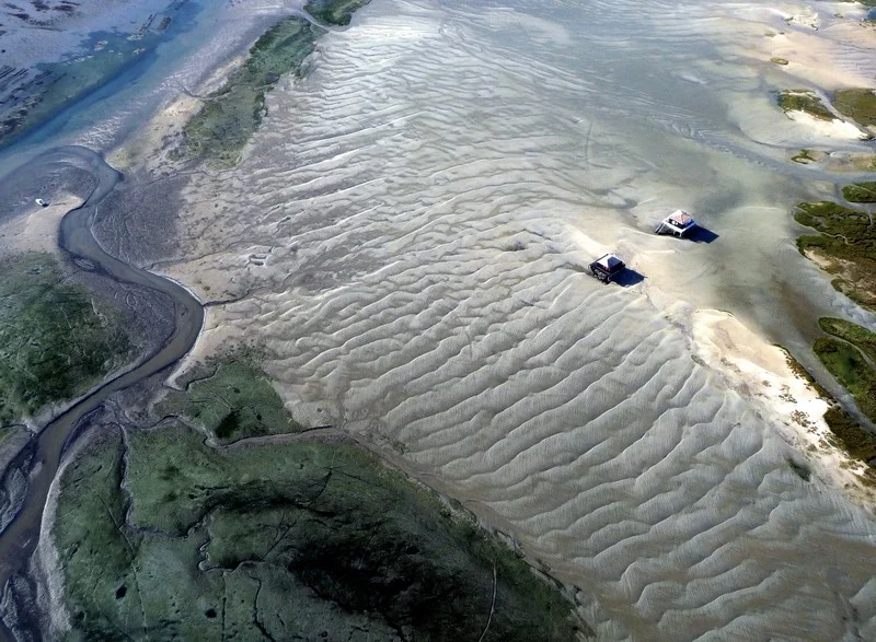 The Tchanquees Huts in the Arcachon Bay by Yann Vitasse, distributed by EGU under a Creative Commons licence.