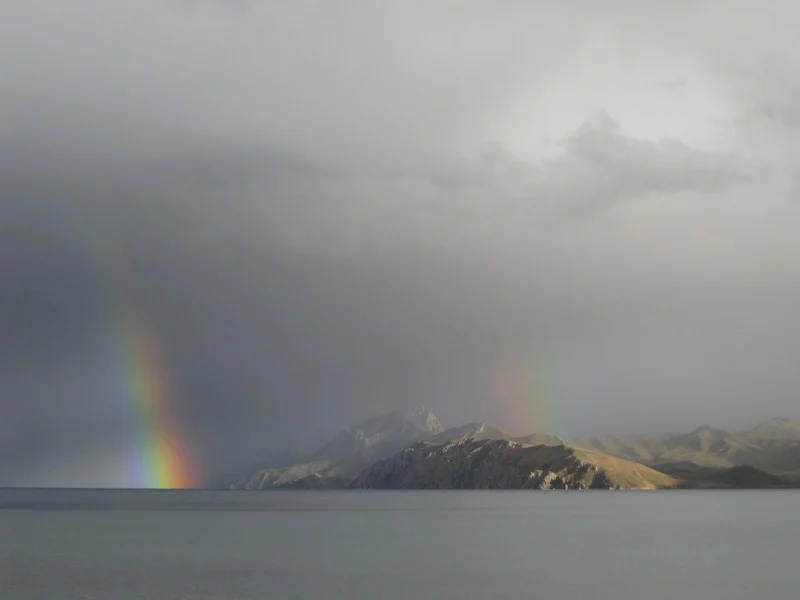 Double rainbow over a Tibetan Plateau lake by Janneke IJmker, distributed by EGU under a Creative Commons licence.