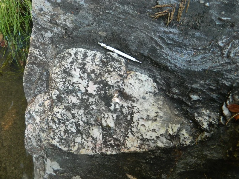 Pegmatite intrusion in mylonitc granite. (Credit: Lucy Chernale via imaggeo.egu.eu)