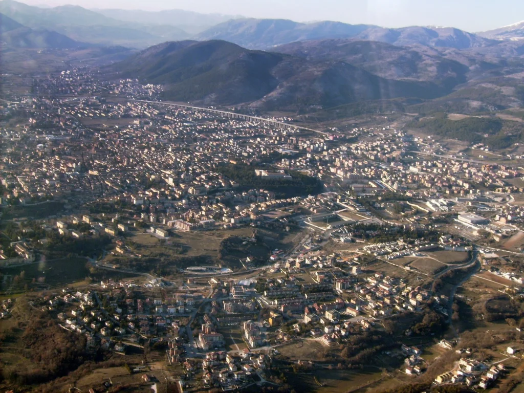 Aerial view of the city of L'Aquila east-centre (Photo Credit: Public Domain, via Wikipedia.org)