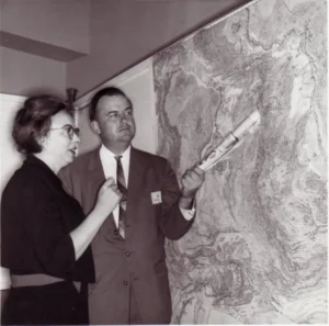Bruce Heezen and Marie Tharp with the 1977 World Ocean’s Map. Credit: Marie Tharp maps, distributed via Flickr.