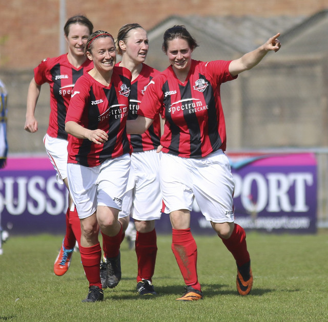 A football team celebrates together after scoring a goal!