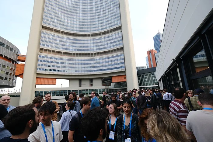 Attendees mingle during the conference icebreaker on Sunday.