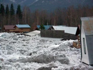 Ice and floodwater inundate a town in Alaska because an ice jam formed downstream (credit: U.S. National Park Service on Wikimedia Commons)