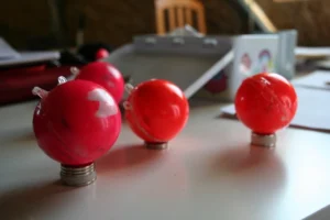 The ETracers stacked on small magnets. This temporarily stops their bleeps [Credit: E. Bagshaw].