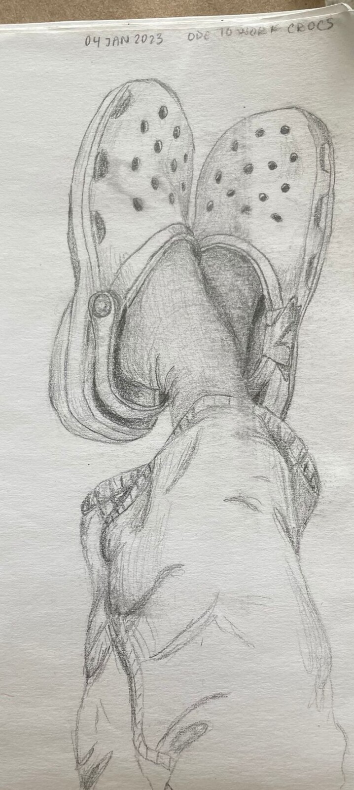 Pencil painting of legs and crocs on called "Ode to work Crocs"