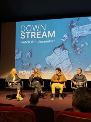Four panalists are sat on a stage for the UNESCO day for glaciers. Larissa is second from the left.
