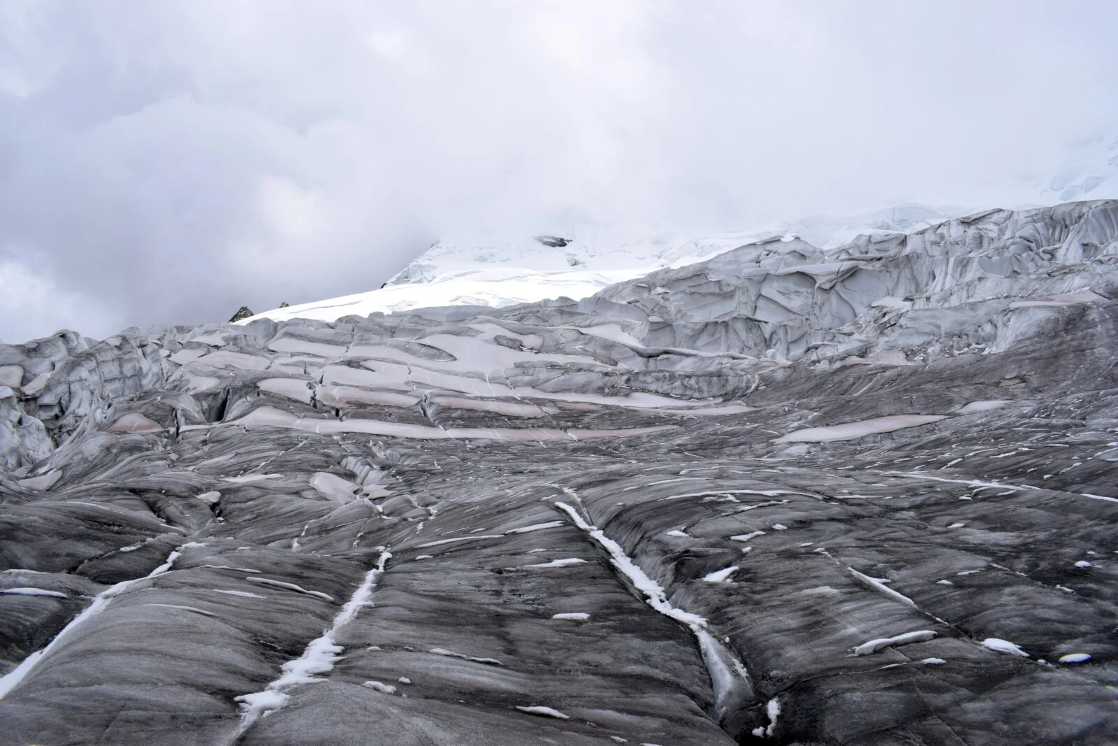 View of the lower part of a glacier in the Cordillera Blanca in Peru with the presence of black carbon at the end of the dry season. 