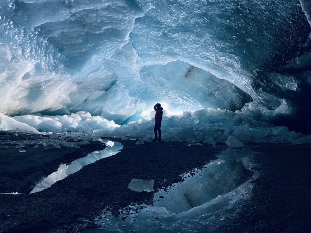 Peak glacier extinction in the mid-twenty-first century