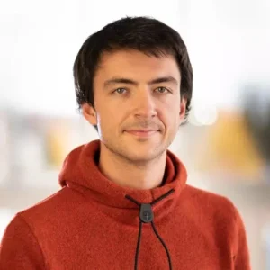 Portrait photograph of Alex looking at the camera