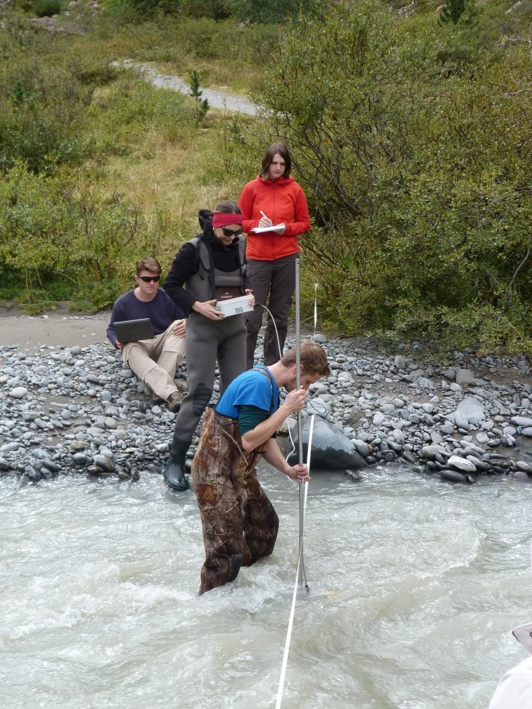 Measuring turbidity in the water column of the Riffler Creek, a tributary of the River Fagge (Image credit: Ciara Fleming).