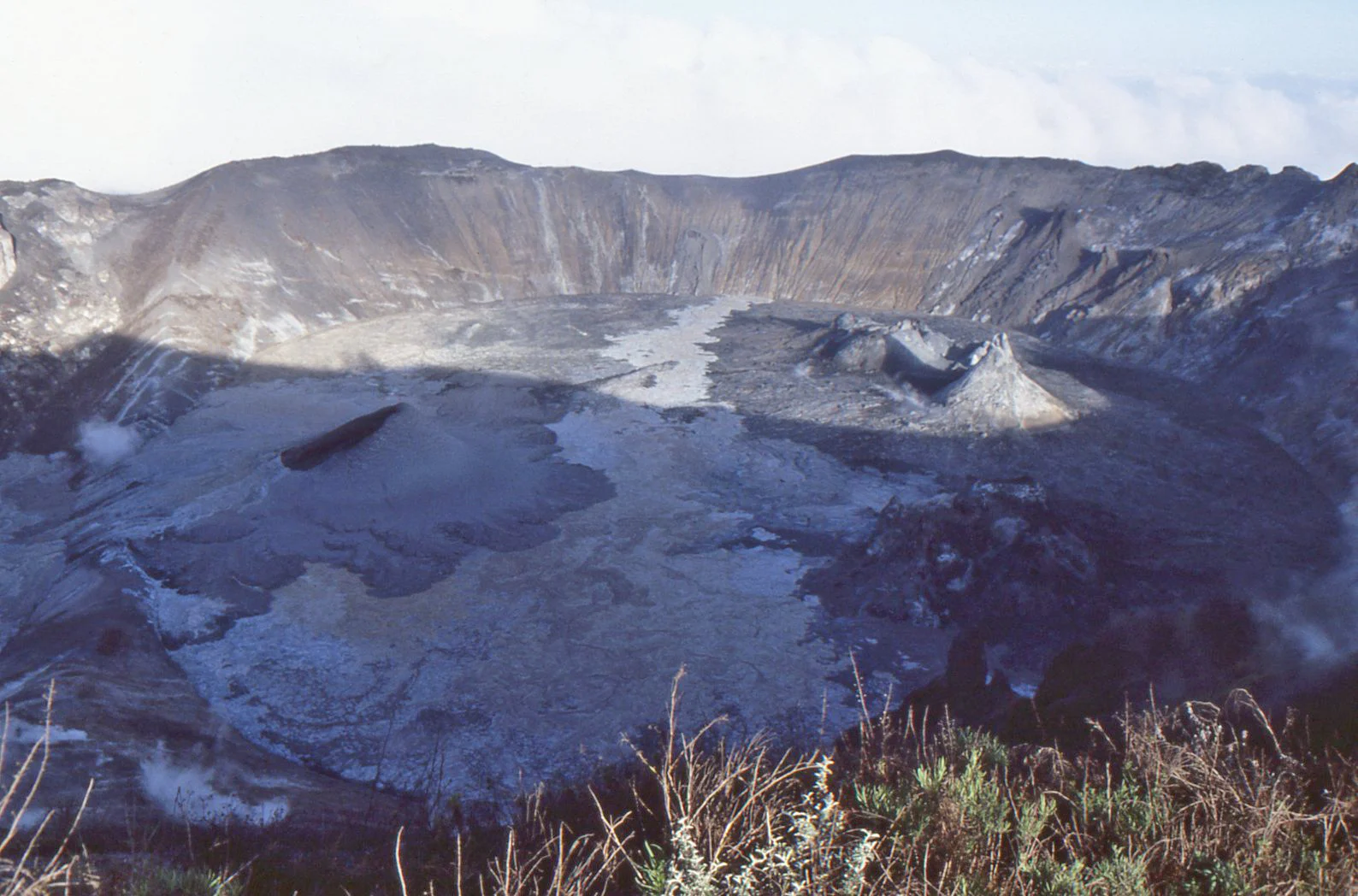Early morning shadow across the active crater of Oldoinyo Lengai, November 1988.