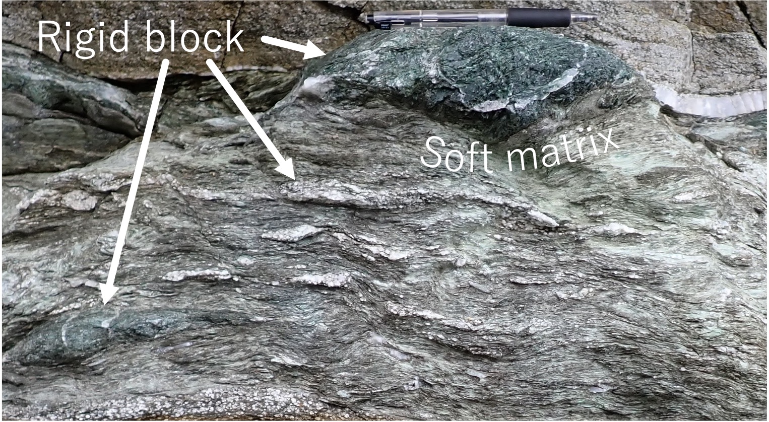 Outcrop photo of block-in-matrix fabric.