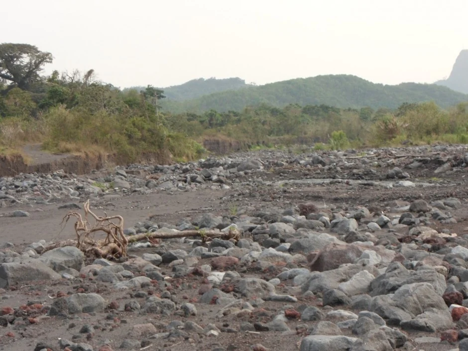 2012 Lahar Deposits, Fuego, Guatemala (note the destroyed road in the background) (Credit: Joel Gill, 2014)