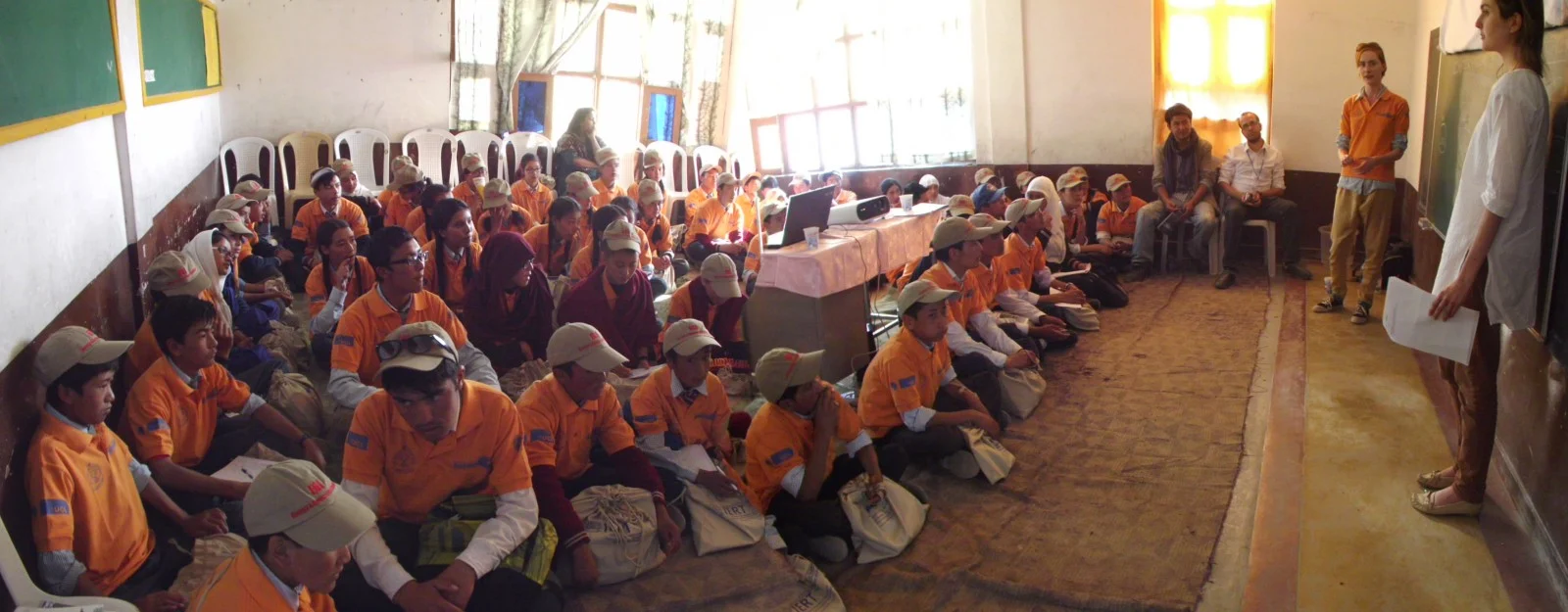 Celia Willoughby and Katharine Sherratt talk to students about the impacts of landslides.